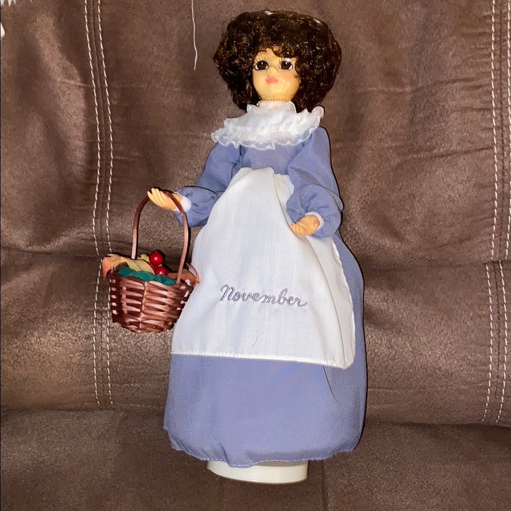 Charming Doll in Gray Dress with Basket